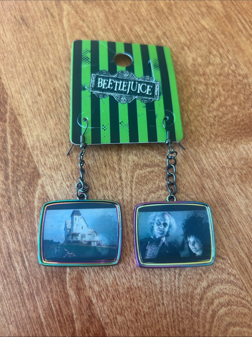 New in packaging Beetlejuice Hologram Dangling Earrings